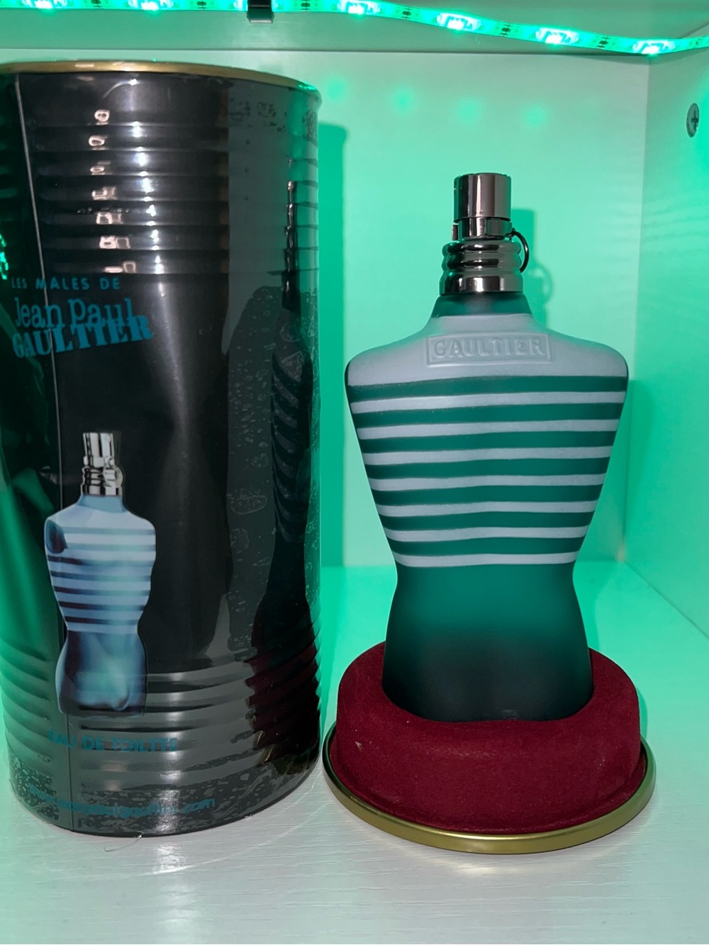 Jean Paul Gaultier striped torso bottle in teal and white